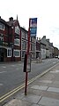 English: A bus stop in Castle Street, Salisbury, Wiltshire. A Salisbury park and ride service, as well as many city and rural services, use this stop, on their way out of the City Centre.