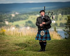 Piping at a wedding by Iainmacharg