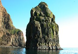 A "stakkur" ("not really peaked basalt stack") on Beinisvørð's coast.