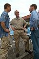 Gary Sinise (left) speaks with The Honorable Gordon R. England, Secretary of the Navy and Rear Adm. Kevin M. Quinn February 22, 2004