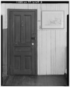 Interior, closeup of wall, entry door and floor of room taken from the southeast - J. Weingartner and Son Cigar Factory, 414 East Walnut Street, North Wales, Montgomery County, PA HABS PA,46-AMB,13-8.tif