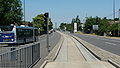 English: A piece of Guided Busway, on the A23 road in Crawley. The road is named London Road at this point. This is part of the Crawley Fastway guided bus system, and leads to the bus lane over the middle of Tushmore Roundabout, helping buses get past other traffic.