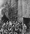 Doolittle’s men require air raid shelter too. Major General James Doolittle’s Tokyo raiders are grouped outside this shelter carved from the mountainside. They lived here for 10 days after assembling from their Chinese mountain retreats. Japanese planes raided nearby villages frequently