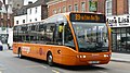 English: Arriva The Shires 2401 (YJ57 EKF), an Optare Versa, in Oxford Street, High Wycombe, Buckinghamshire, on Orange Route service 39, part of the High Wycombe Rainbow Routes network, supported by Buckinghamshire County Council. This Versa was on of three early examples delivered to Arriva for evalutation purposes. This is one of a pair at High Wycombe, the third went to Arriva Midlands.