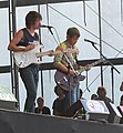 The Arctic Monkeys, playing live on a festival in June 2006 (Alex Turner & Jamie Cook).