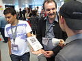 cluboffice Berlin Roger Bamkin, Wikimedia UK, and Oscar Costero, Wikimedia Venecuela, presenting a tile with QR code of the Shire Hall to Ruben Demus, Wikimedia Österreich