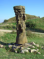 A modern wood-carved statue of Svetovid