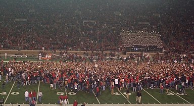 Students and fans rush the field after the unranked Red Raiders upset the #3 Oklahoma Sooners in 2007.