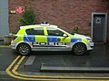 Merseyside Police Car on double yellow lines at back entrance to Magistrates court on cheapside.