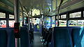 Southern Vectis 1103 Blackgang Chine (HW08 AOS), a Scania OmniCity. This is the downstairs interior, looking back to front.}}
