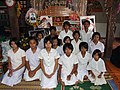 mouning people in Thailand (white clothing is the mourning colour of Buddhists)