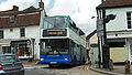 English: Southdown PSV 132 (T132 AUA), a DAF DB250/Plaxton President, in London Road, Westerham, Kent, waiting to turn right into Market Square, on route 410. Since new Surrey County Council contracts started, route 410 has been curtailed at Oxted, replaced to Westerham by routes 594 and 595. This was after Southdown PSV won the contract for the routes from Metrobus, and as they already ran the 410, they were able to shuffle things around slightly.