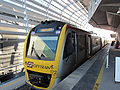 Airtrain stopped at Brisbane International Airport.