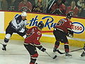 Mattias Norstrom, Jarome Iginla and Daymond Langkow