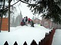 Lumituisku - It is snowing, but the pupils of Alikerava School are enjoying themselves.