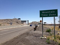 2014-07-05 12 40 49 Sign for the Mountain Time Zone along Interstate 80 eastbound just west of the Utah border in West Wendover, Nevada.JPG