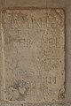 Inscription sur le mur de l'église. RVINEE 1597 REPAREE 1600 ESTANTS CONSVLS HELIE MARTIN AITHE ORTOVLS