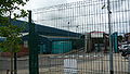 English: The Arriva The Shires High Wycombe depot. It was opened in 2005, and is situated in Lincoln Road, Cressex Industrial Estate, High Wycombe, Buckinghamshire. This photograph shows the bus wash.