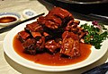 無錫特產之一的醬排骨，以無錫三鳳橋肉莊、真正老陸稿薦所製最為有名 Spareribs sauce is one of the local specialties of Wuxi