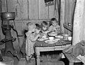 Christmas dinner in home of Earl Pauley, near Smithland, Iowa, December 1936