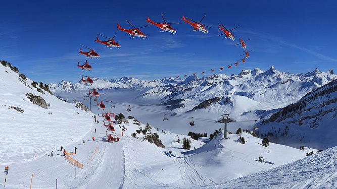 "CH.SZ.Stoos_Fronalpstock_Sequence_Rescue-Helicopter_REGA_16K_16x9-R.jpg" by User:Roy Egloff