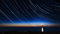 Star trails with sunset at La Hague lighthouse