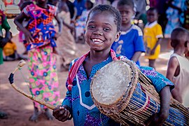 Children learning to play the local drum in northern Region of Ghana by Sir Amugi