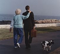 President and Mrs. Bush walk towards their home on Walker's Point after the President's arrival from Washington - NARA - 186396 (cropped).jpg