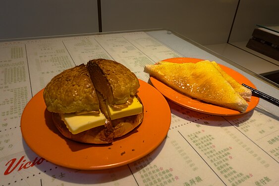 Buttered pineapple bun and butter and condense milk on toast.