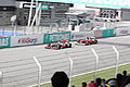 Button pursued by Fernando Alonso at the 2010 Malaysian GP.
