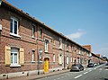 * Nomination Résidence de la Chapelle d'Elocques, former workers' housing of the Fives Cail factory, Rue Jules Gesdes, Hellemmmes-Lille, France --Velvet 06:36, 12 July 2021 (UTC) * Promotion  Support Good quality. --Ermell 07:47, 12 July 2021 (UTC)