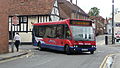 English: Wilts & Dorset 2625 (S625 JRU), an Optare Solo, turning from Salt Lane into Rollestone Street, Salisbury, Wiltshire, running out of service.