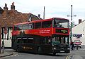 English: Wilts & Dorset 3155 (R155 NPR), a DAF DB250/Optare Spectra, turning from Salt Lane into Rollestone Street, Salisbury, Wiltshire, on the Stonehenge Tour. It is wearing the new livery for the service.