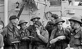 Canadian troops resting on board a destroyer.