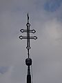 English: Cross on the church of Rateče, Slovenia