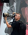 Press photographer with mammoth lens at III Meeting of Fans of the TV series 'M jak miłość' in Gdynia 2009