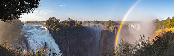 View of the Victoria Falls of the Zambezi River, border between Zambia (left side) and Zimbabwe (right side).