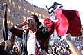 Andrea Mari celebrating after winning the Palio of August 16th 2009