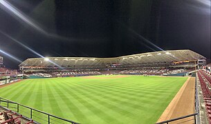 Estadio Tomateros at night.jpg