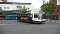 English: Arriva The Shires 3203 (R203 RBM), a Scania L113CRL/Northern Counties Paladin, leaving High Wycombe bus station into Bridge Street, High Wycombe, Buckinghamshire, on route 32. Unfortunately, the car in the forground drove through a red light, and the bus driver's hand can be seen about to use the horn. Blue Route service 32 is part of the High Wycombe Rainbow Routes network, supported by Buckinghamshire County Council. When I visited High Wycombe, only one bus has been painted into Blue Route livery, so other buses on route 32 were in normal livery. However, a handfull of buses are now painted blue and in operation on the route.