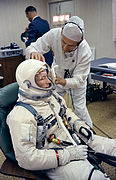 Gemini 4 White with suit technician.jpg