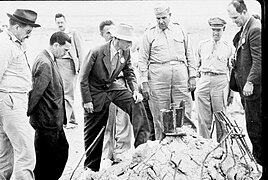 Oppenheimer and Groves at the Trinity detonation site.jpg