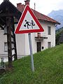 English: Street sign with children in Rateče, Slovenia