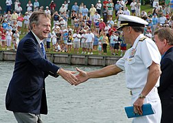 US Navy 090506-N-0486G-003 Former President of the United States George H. W. Bush shakes hands with Rear Adm. Joseph Kernan, commander, U.S. Naval Forces Southern Command and U.S. 4th Fleet on the 18th green at TPC Sawgrass.jpg