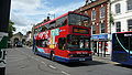 English: Wilts & Dorset 3160 (T160 ALJ), a DAF DB250/Optare Spectra, in Blue Boar Row, Salisbury, Wiltshire, on route 184. It still carries Activ8 branding, despite having been replaced on route 8 by new Scania OmniCitys.