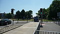 English: Metrobus 576 (YT09 BKO), a Scania OmniCity, in Crawley, West Sussex, on route 10, going from the guided busway on the A23 London Road, onto the bus lane over the middle of Tushmore Roundabout.