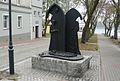 Monument to Blessed Jutta and bishop Heidenrech with model of medieval Chełmża