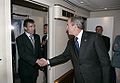 George W Bush welcomes Rasmussen on Air Force One after landing at Kastrup, July 5, 2005.