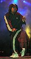 Chuck D in an Adidas sweatsuit