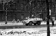 UNPROFOR armoured personnel carrier passes the Presidency building.